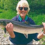 Photo of Lady Plastow with a salmon